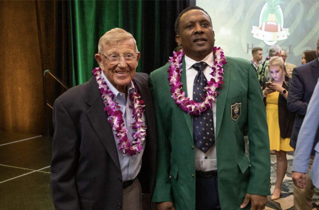 Lou Holtz and Tim Brown