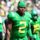 Oregon football player punches an Oregon State fan in the face after the game